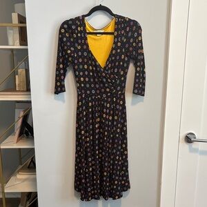 Maeve by Anthropologie Navy and Yellow Floral Wrap Front Midi Dress